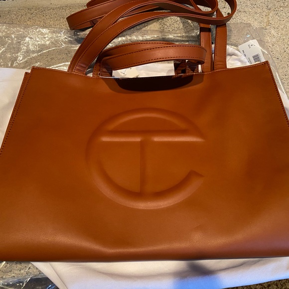 sold out medium shopper telfar bag in the color tan. - Picture 1 of 12
